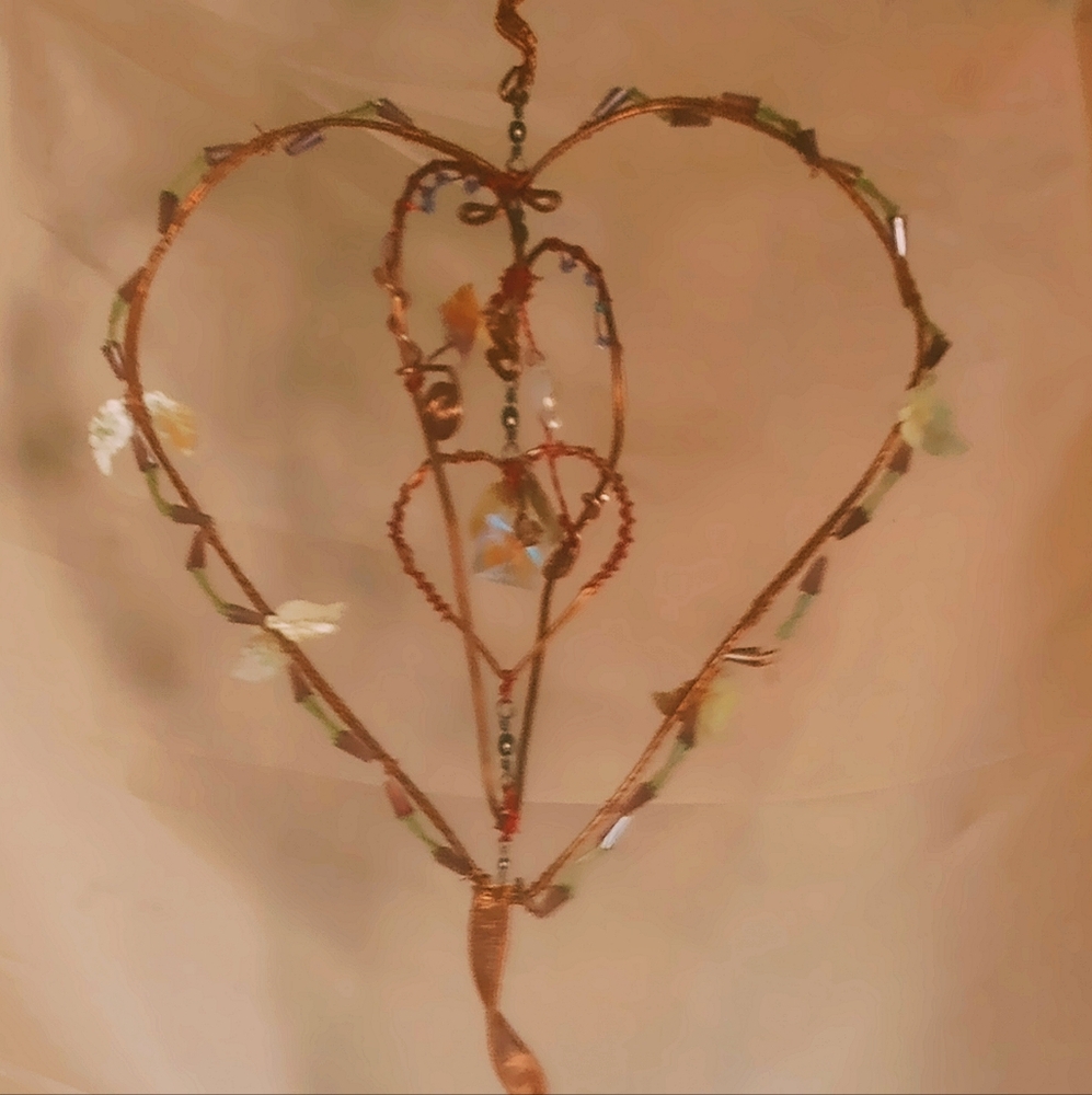 Hand Crafted Copper Spinning Hearts - Picture 2 of 3